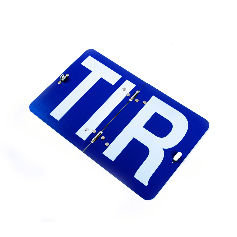Табличка TIR (білі букви на синьому тлі) закривається, з фіксатором